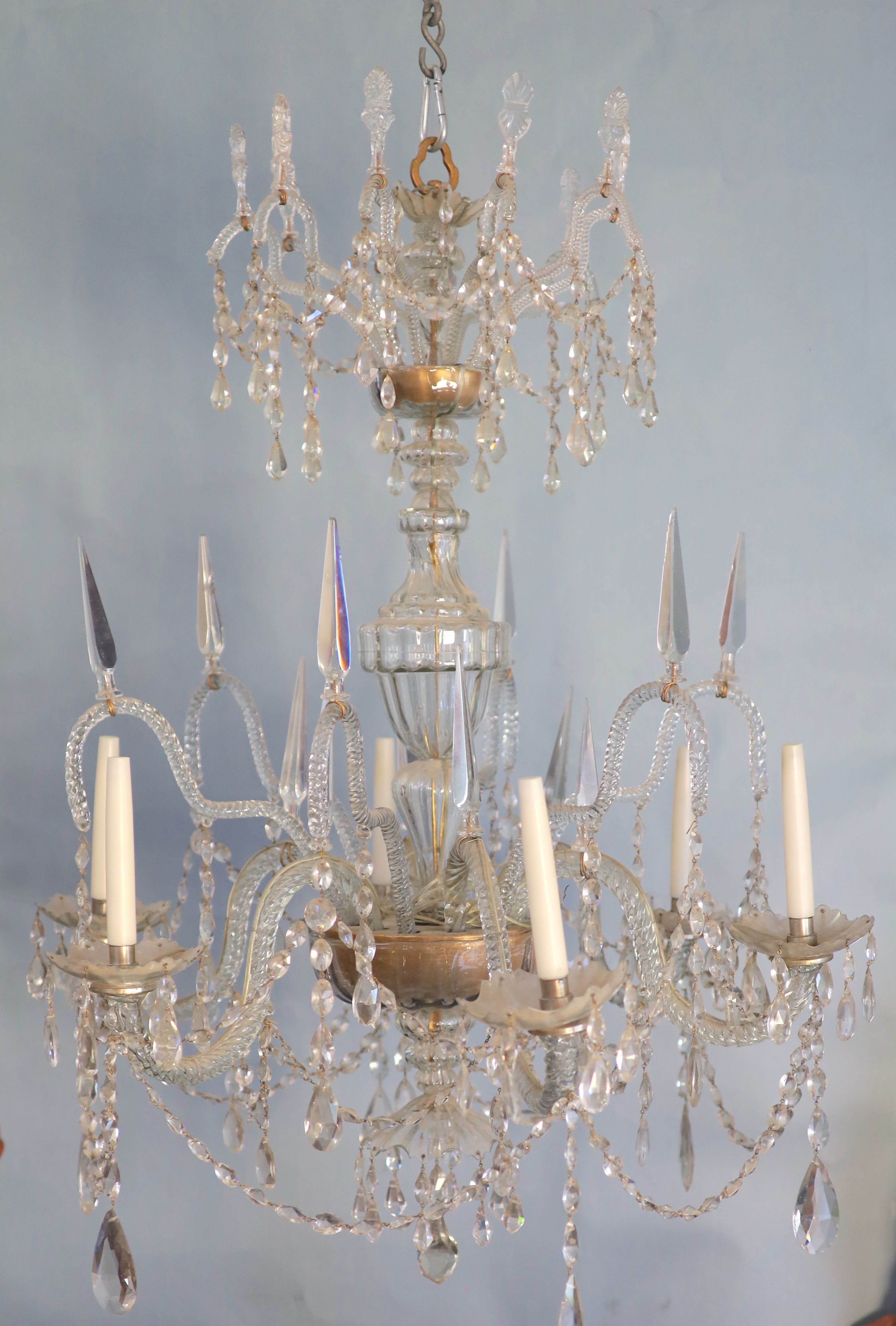 A large George III cut-glass six light chandelier, c.1780, 85cm wide, 102cm high. Provenance - Sotheby’s’ 1992 sale of the contents of Groombridge Place, near Tunbridge Wells, valued in the 1930 inventory of the house at